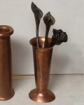 Lilies and a rose in a copper vase, by Dick Carlson